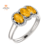 14KT GOLD 1.32 CTW CITRINE & 0.10 CTW DIAMOND 3 STONE OVAL HALO RING