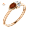 14KT GOLD 1/4 CT GARNET & 1/8 CTW DIAMOND 3 STONE RING