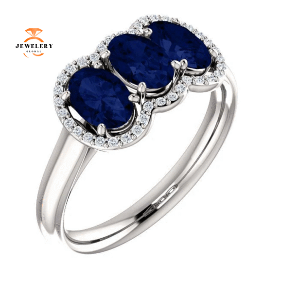 14KT GOLD 2.10 CTW SAPPHIRE & 0.10 CTW DIAMOND 3 STONE OVAL HALO RING