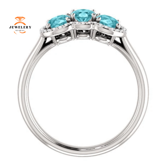 14KT GOLD 2.25 CTW BLUE ZIRCON & 0.10 CTW DIAMOND 3 STONE OVAL HALO RING - Image 2