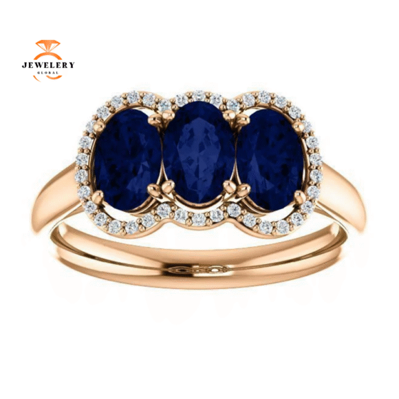 14KT GOLD 2.10 CTW SAPPHIRE & 0.10 CTW DIAMOND 3 STONE OVAL HALO RING - Image 3