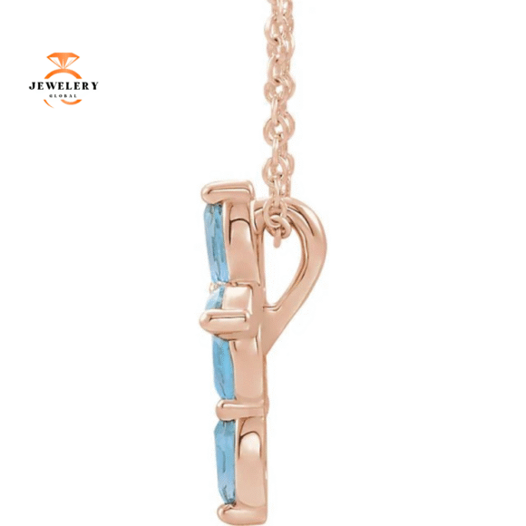14KT GOLD 0.35 CTW MARQUISE AQUAMARINE PETITE CROSS NECKLACE - Image 4