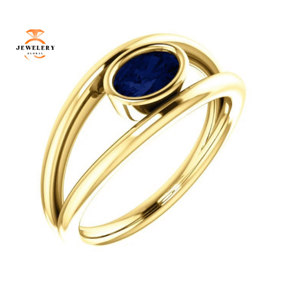 14KT GOLD 0.70 CARAT OVAL BEZEL SET SAPPHIRE RING