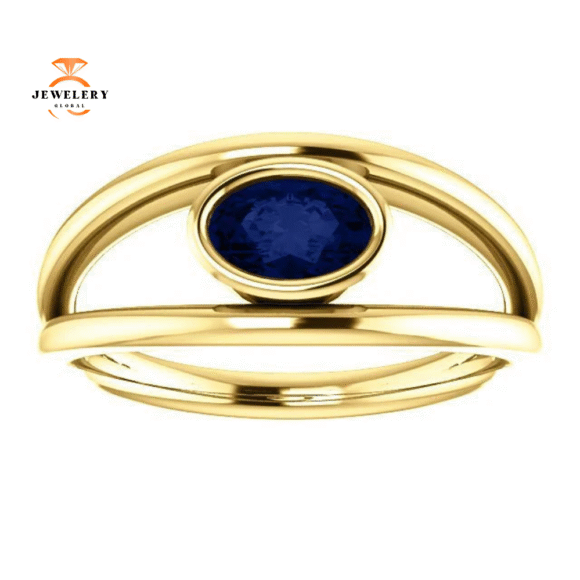14KT GOLD 0.70 CARAT OVAL BEZEL SET SAPPHIRE RING - Image 2