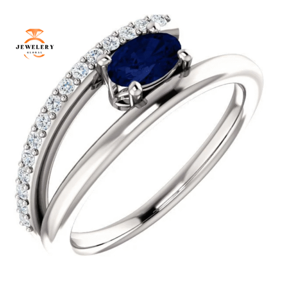 14KT GOLD BLUE SAPPHIRE & 1/8 CTW DIAMOND BYPASS RING