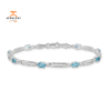 14KT WHITE GOLD SWISS BLUE TOPAZ AND DIAMOND BRACELET