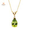 14KT YELLOW GOLD 1.60 CTW PEAR PERIDOT PENDANT & .04 CT DIAMOND 18" NECKLACE